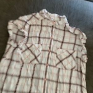 pink sleeveless button down shirt